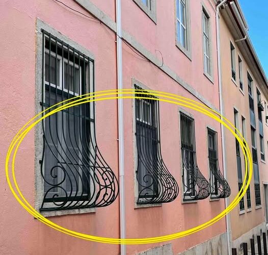 Why do some window grilles have a curve at the bottom?