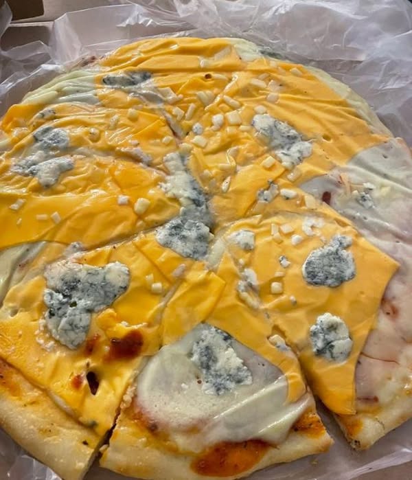 First time buying at a local restaurant called “Food and love”, ordered a four cheese pizza and this is why they delivered.