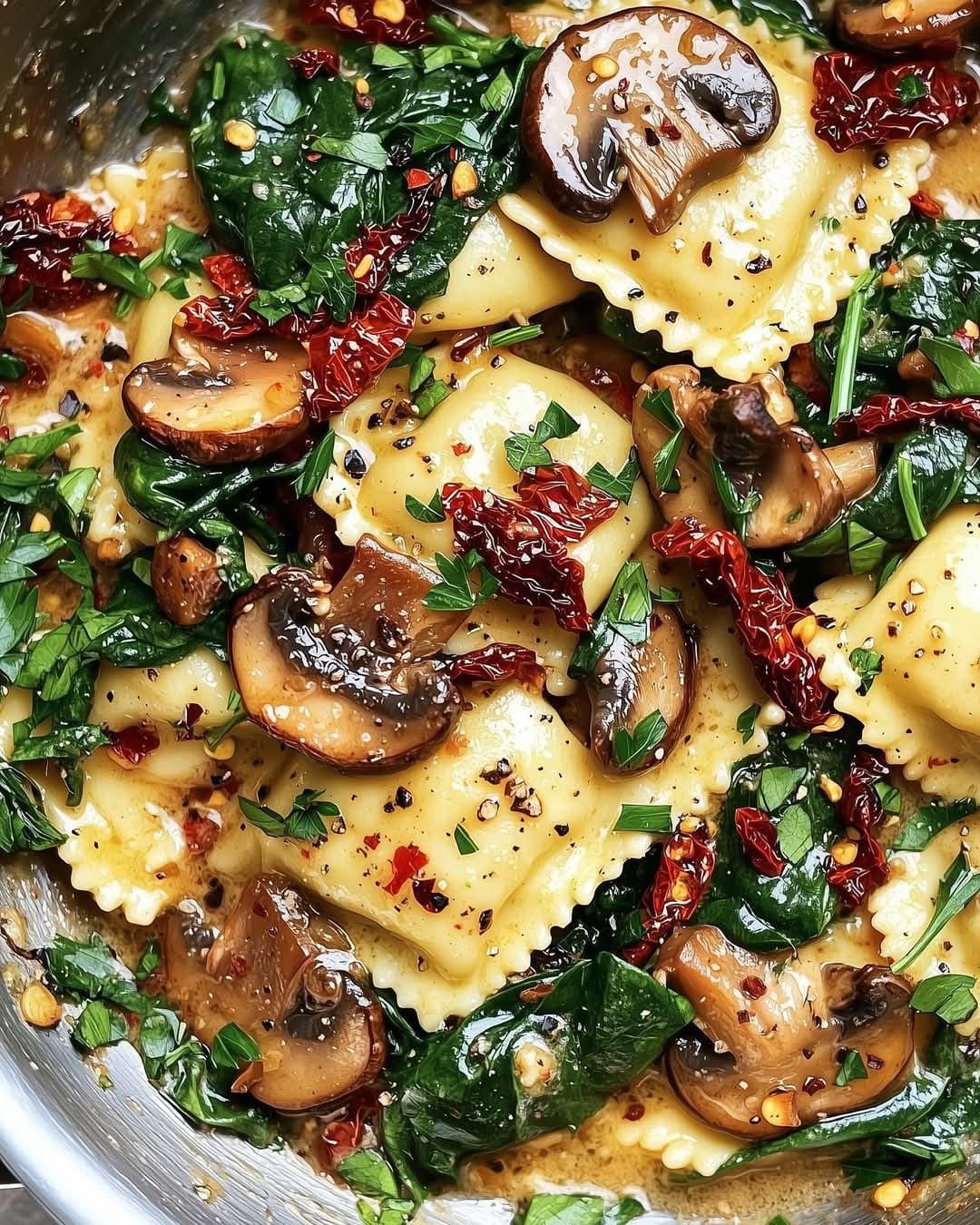 Cheesy ravioli with spinach mushroom and Sun dired tamatoes