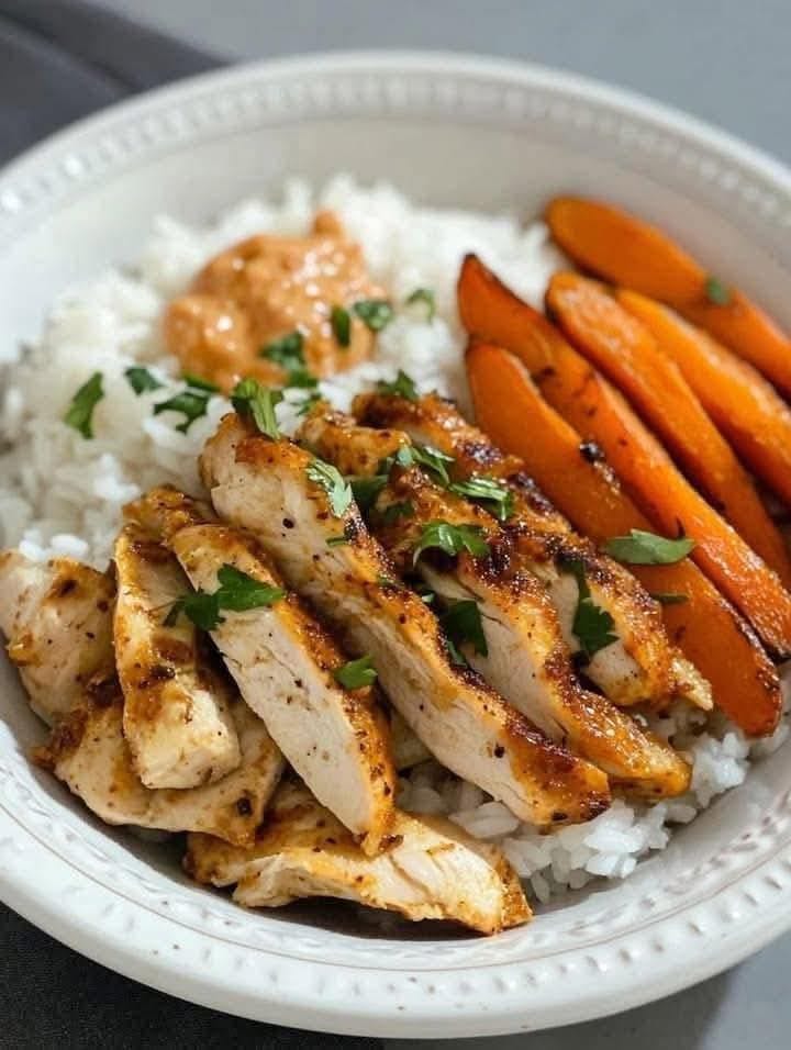 Spicy Peanut Chicken Bowl with Roasted Carrots & Rice