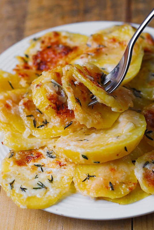 Simple potato gratin with garlic, thyme and Parmesan